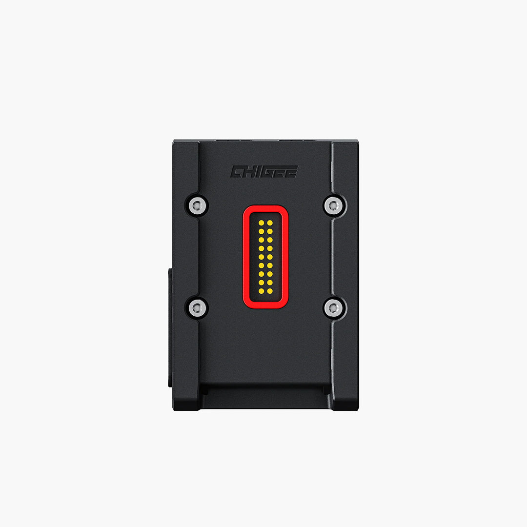 Black electronic quick release module for BMW motorcycle.