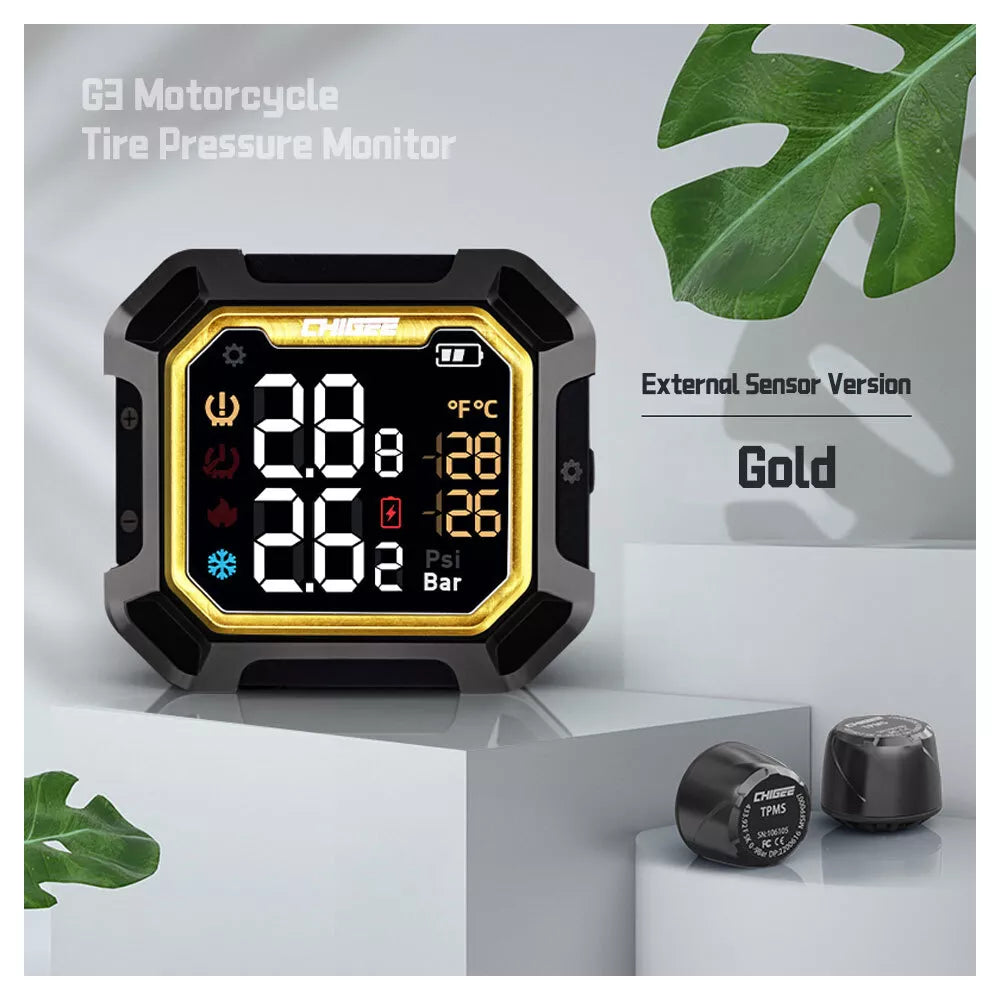 G3 Motorcycle Tire Pressure Monitor with digital display on a white background with green leaves.