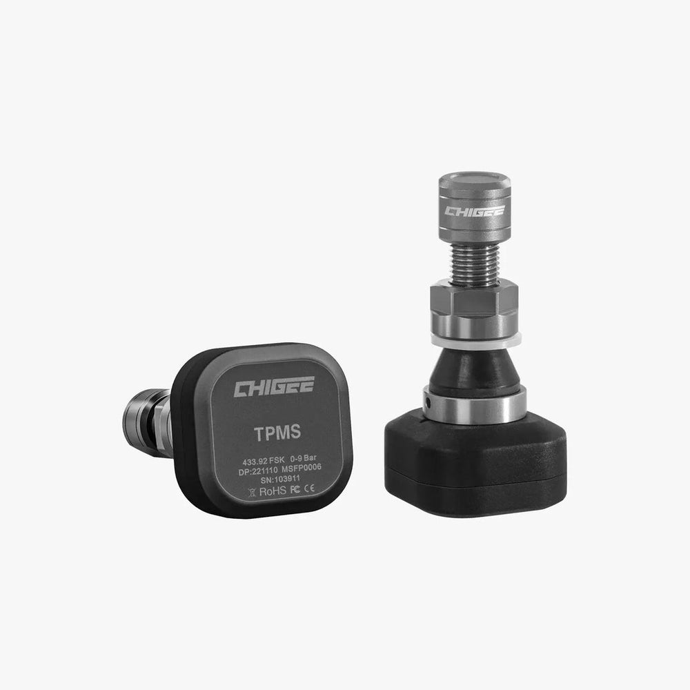 Two Chigee TPMS sensors on a white background